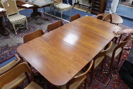 A Danish teak extending dining table designed by Peter Hvidt & Orla Mølgaard Nielsen for France and Daverkosen and ten Dutch manufactur